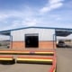 Nave modular ECORAPID 200 m2. Con alero-porche. Zuera, Zaragoza (España) | Cualimetal 1